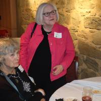 two women paying attention
